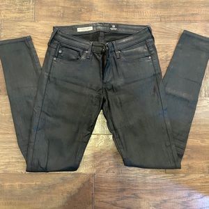 AG black coated skinny jeans/jeggings